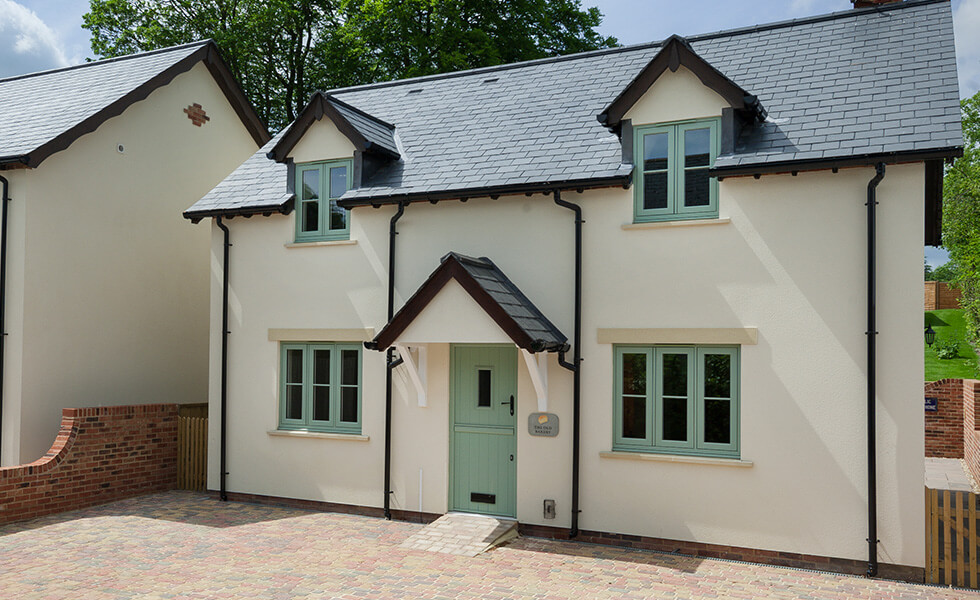 Green uPVC flush sash windows installation