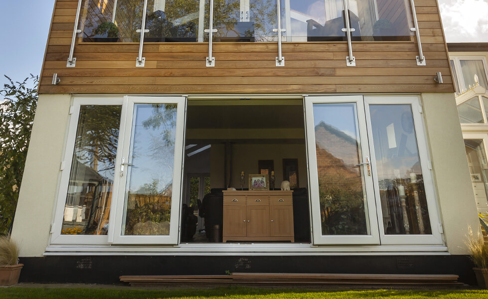 Open white uPVC bifold door