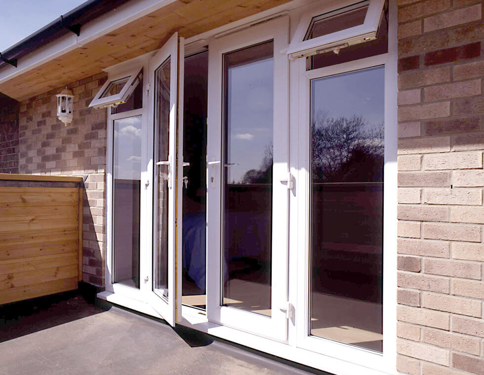 White uPVC french door with side windows