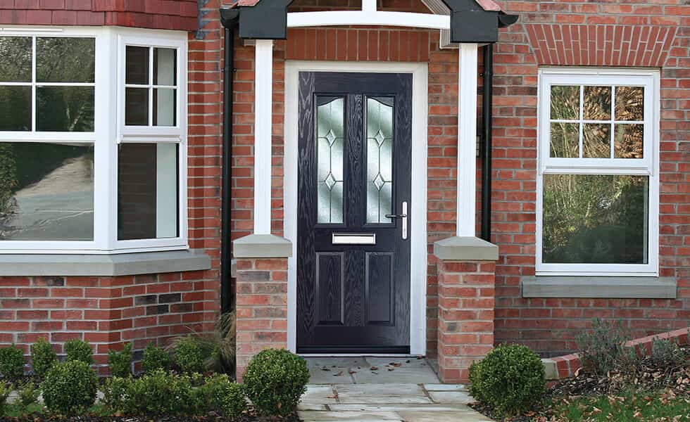 Dark blue composite front door installation