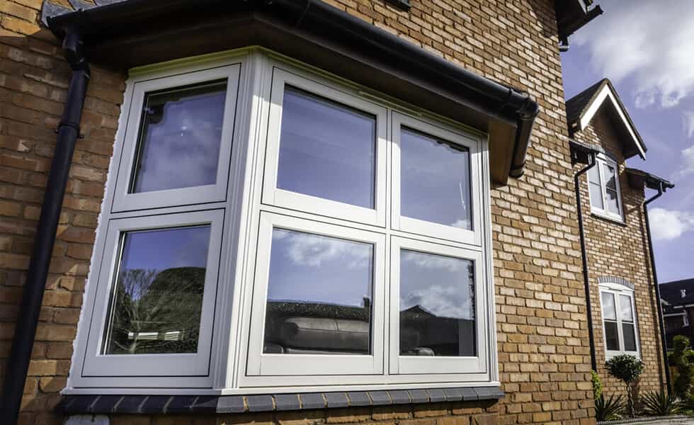 White uPVC flush sash bay window