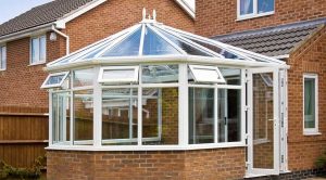 White uPVC conservatory with a Victorian roof