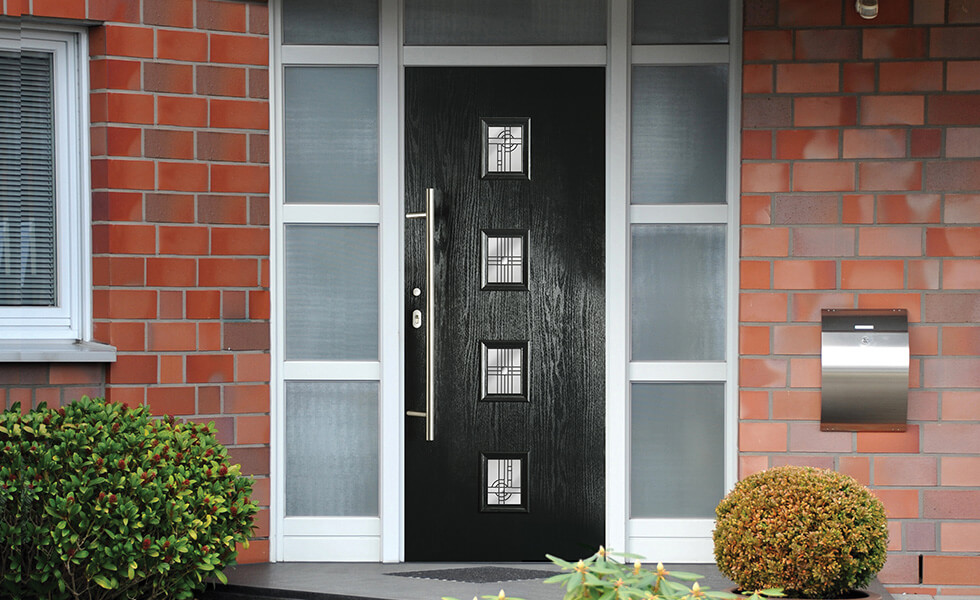 Black front door with side glass panels