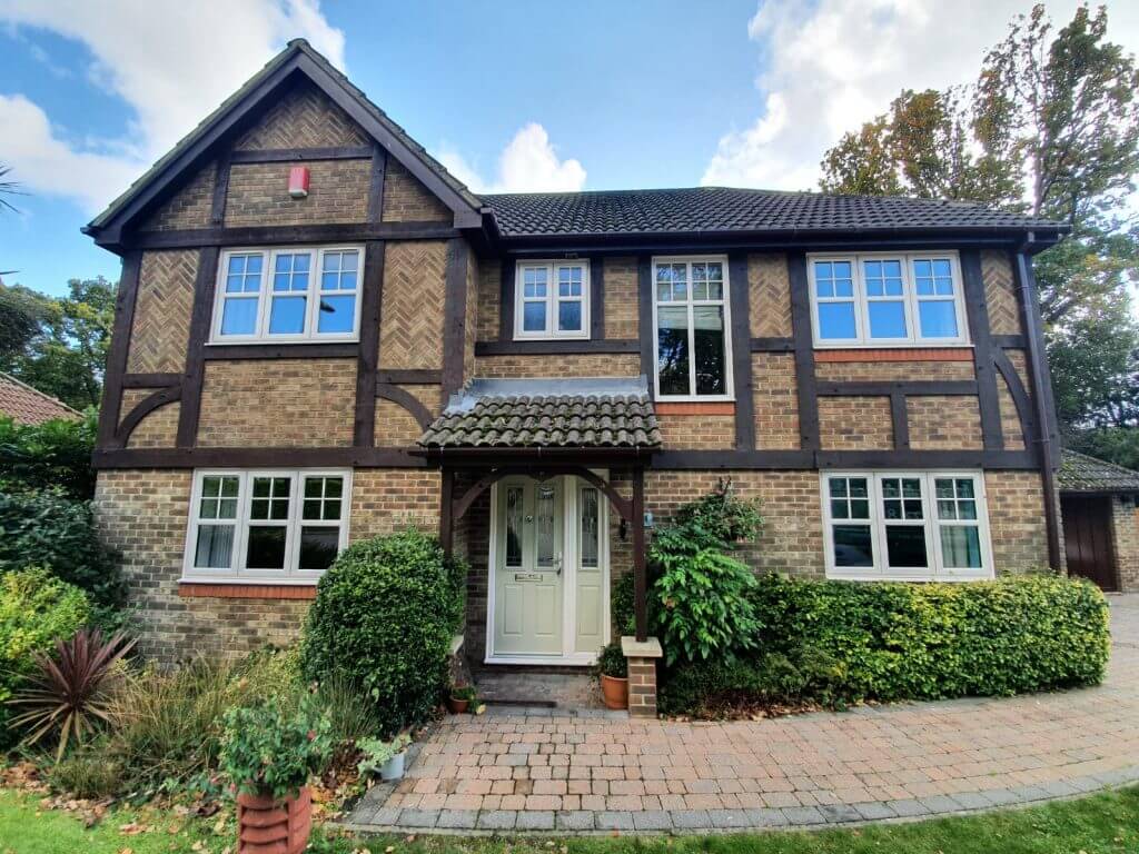 white upvc flush sash windows and front door