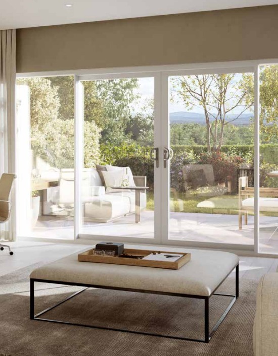 Experience bright, open living with sleek modern aluminium sliding patio doors. Connect indoor comfort with a beautiful outdoor garden view.